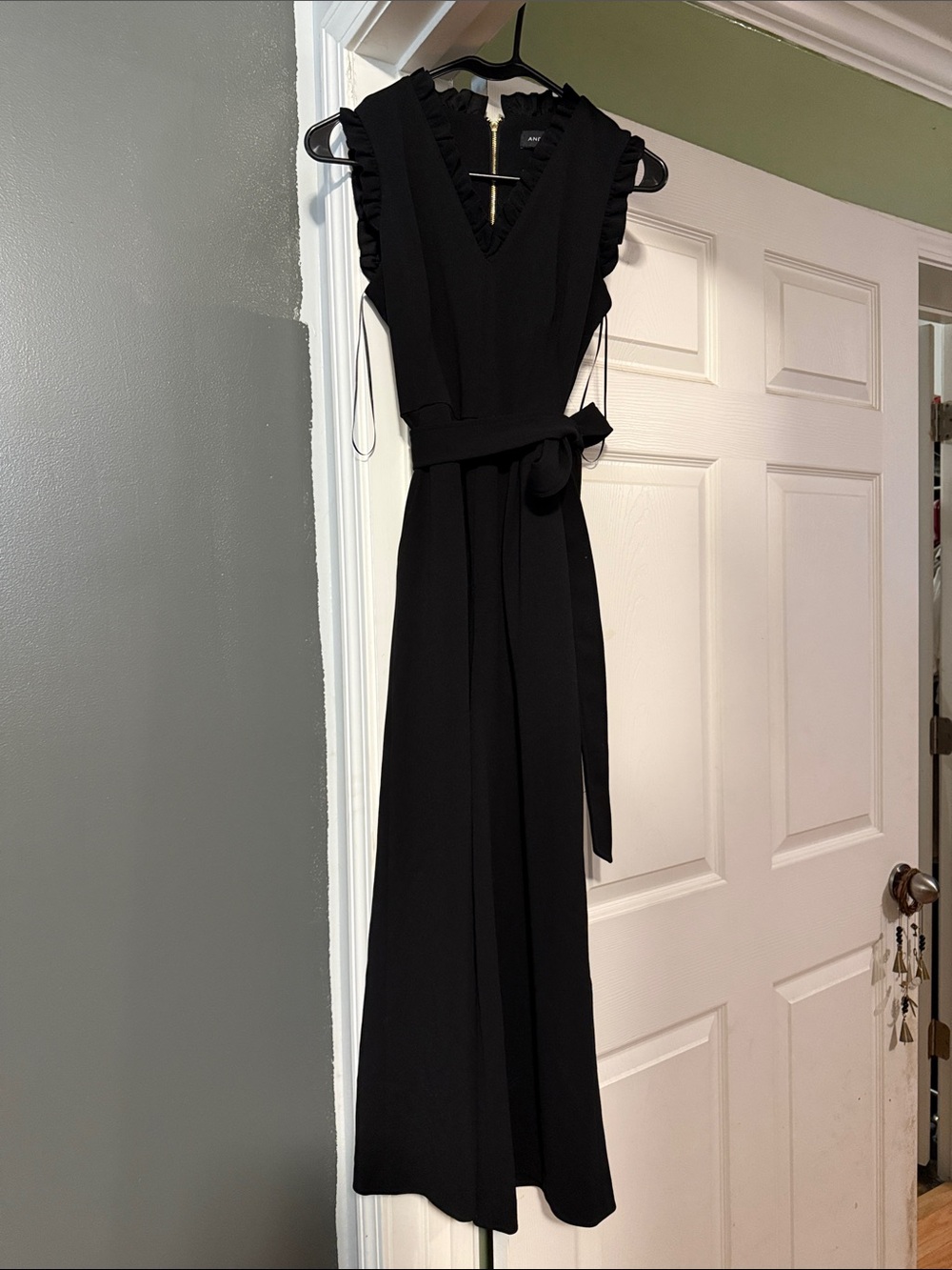 Andrew Marc Black Ruffle-Sleeve V-Neck Jumpsuit with Waist Tie